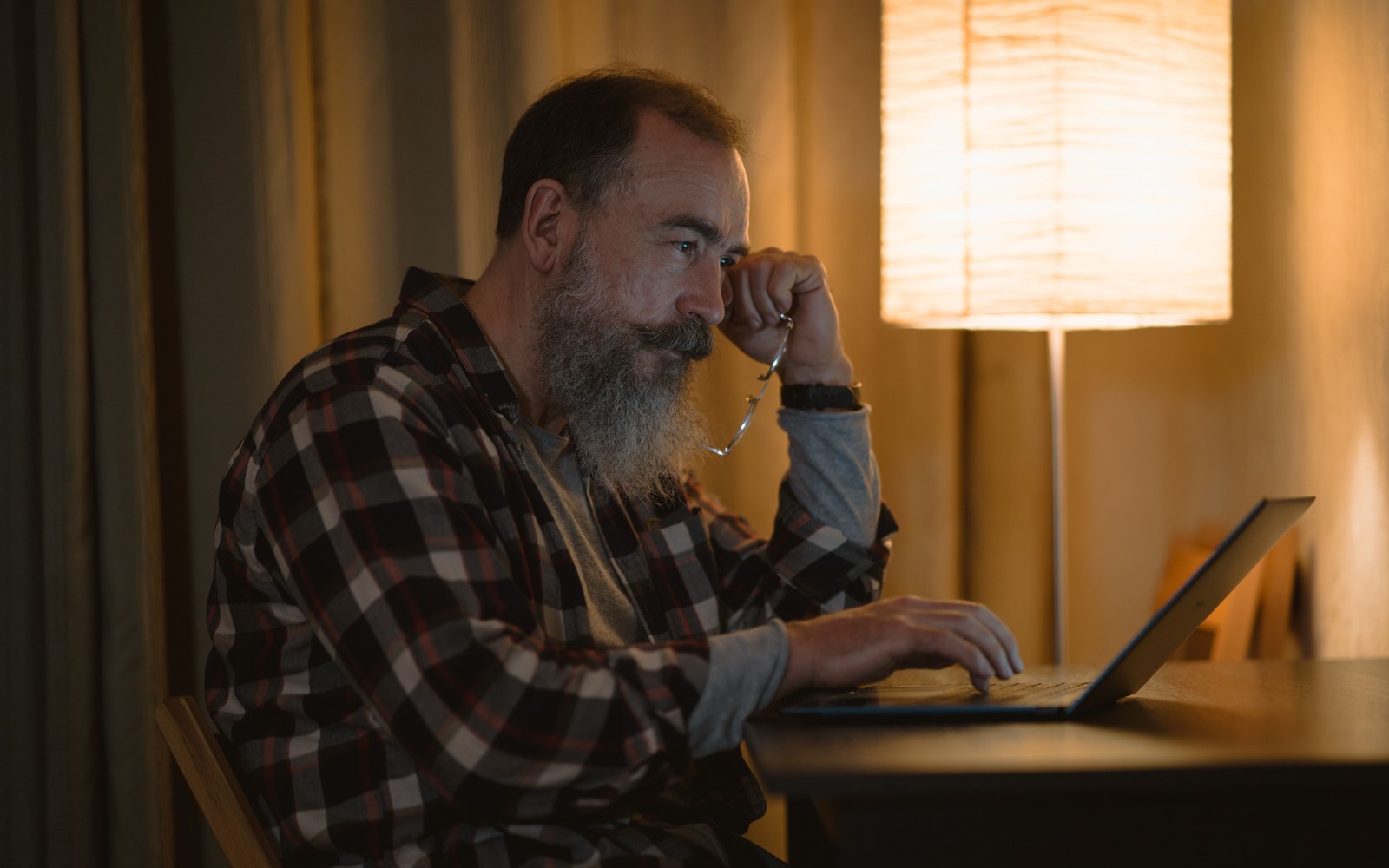 Dave back at his laptop that night, working through the fallout